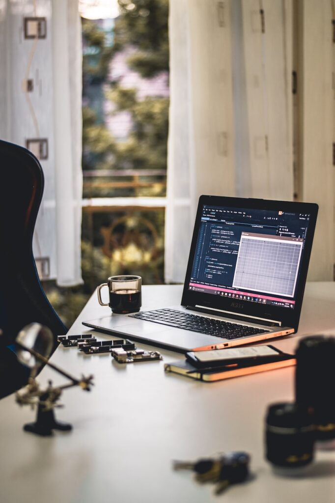 An armchair and a laptop at the office of Opporture.