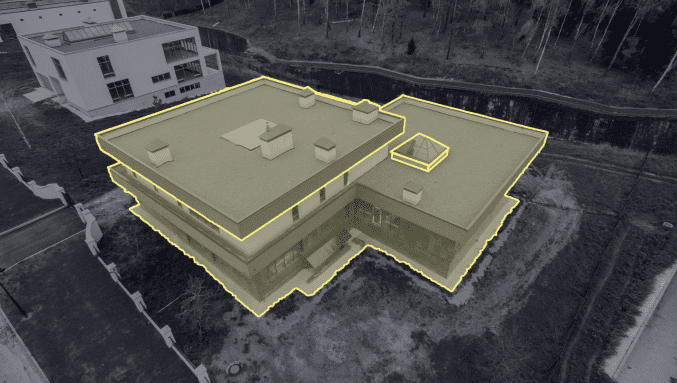 A geospatial polygon annotation image showing a building with various polygons marked.